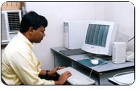 Photograph of a blind computer operator