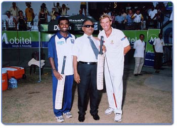 Photograph of Warne and Murali with Mr. Navaratne Banda