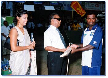 Photograph of Murali with Mr. Navarathne Banda
